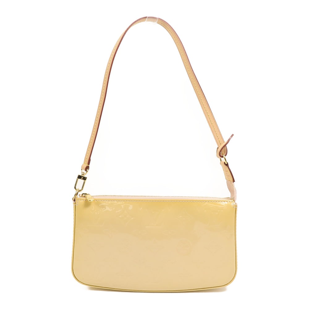 Louis Vuitton Lexington Vernis Yellow: Lexington Pochette shoulder bag in yellow Monogram Vernis patent leather. Includes storage bags and shoulder strap. Size 22.5 x 13 x 4 cm.