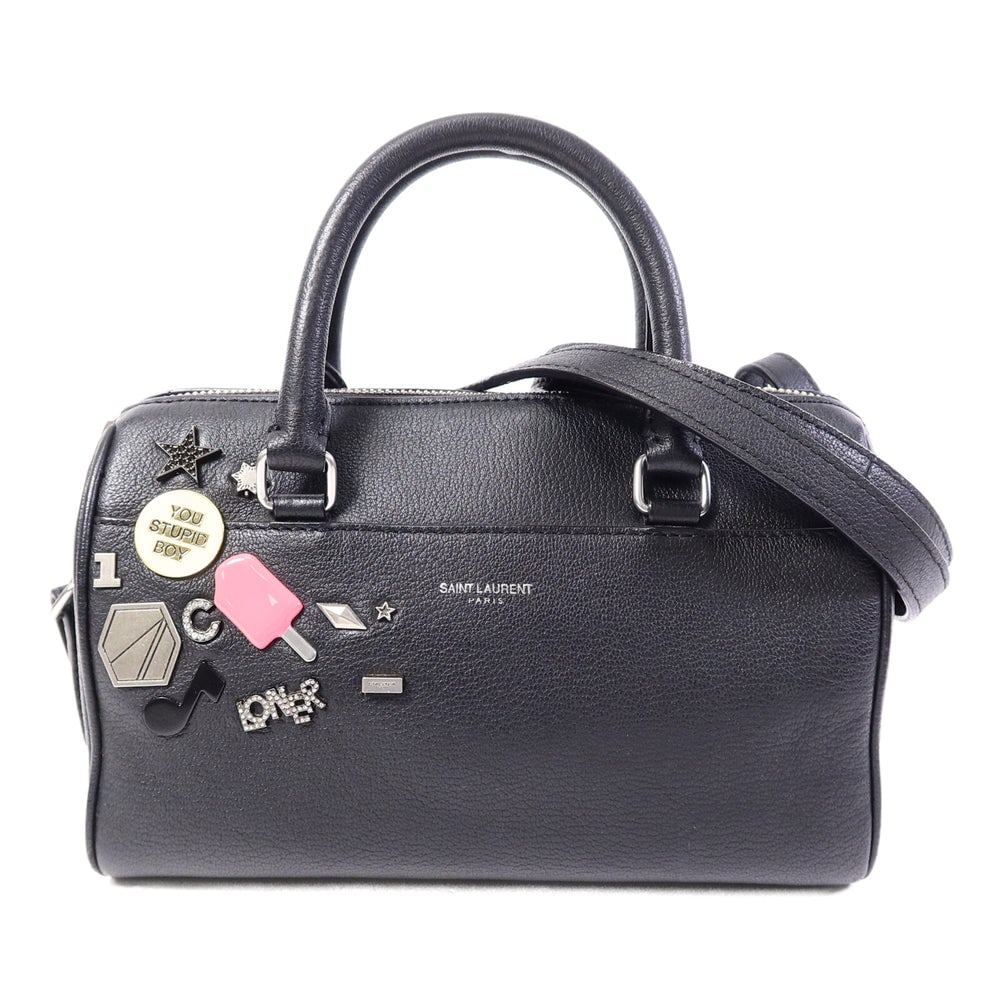 Saint Laurent Baby Duffle Black: Baby Duffle 2 way shoulder bag in black calfskin with silver-tone hardware. Includes shoulder strap. Size 22.5 x 14 x 11.5 cm.