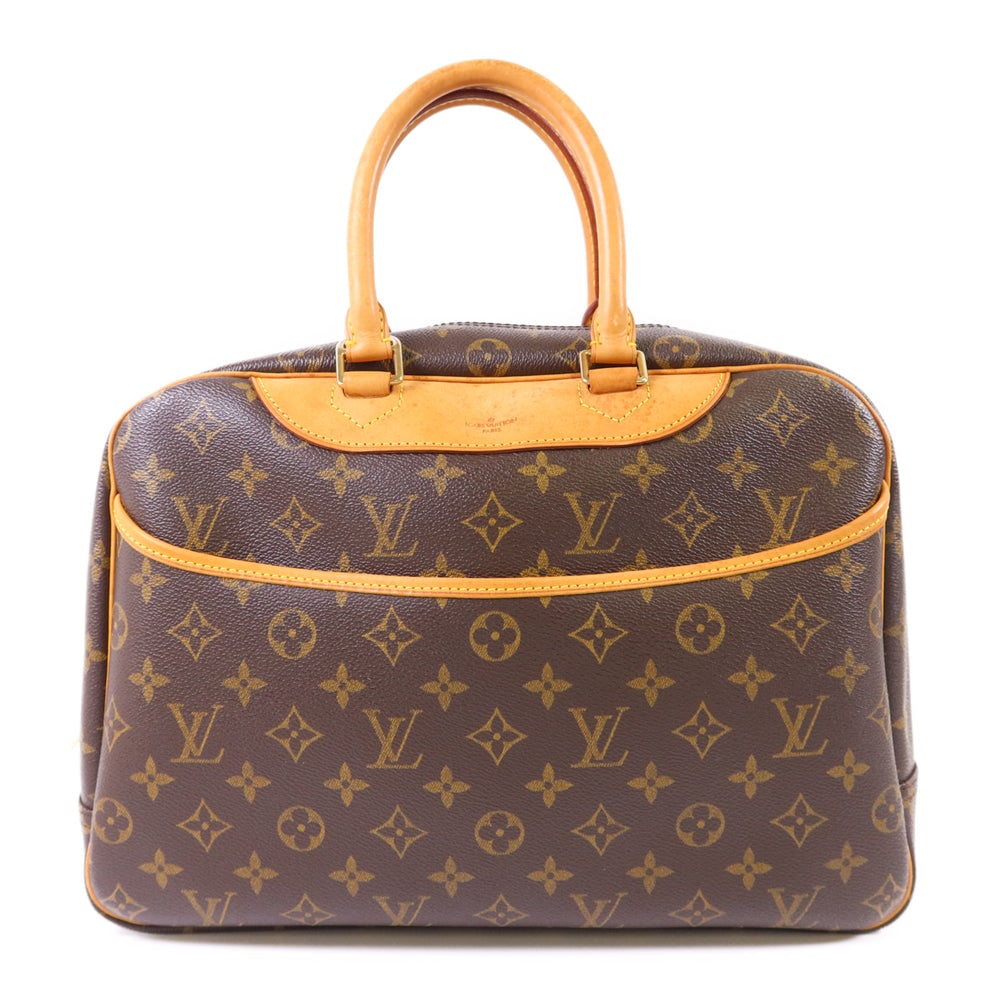 Louis Vuitton Deauville Monogram Bag: Authentic and authenticated Louis Vuitton Deauville handbag in brown Monogram PVC coated canvas. Product no. MB0023. Approx. 34W x 25H x 13D cm with 36 cm handle. Includes storage bags.
