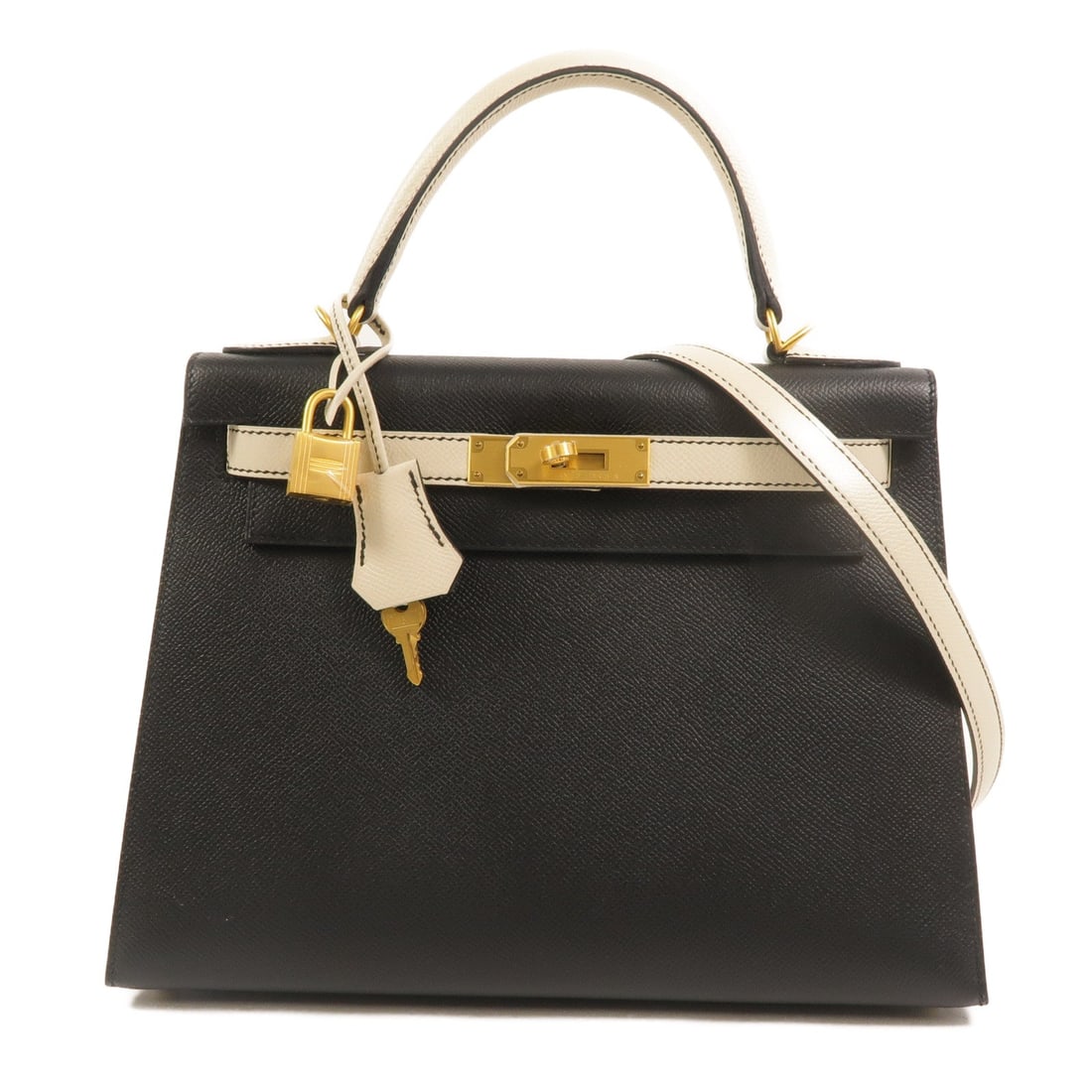 Hermes Kelly 28 SPO Noir Craie: Authentic and authenticated Hermes Kelly 28 SPO 2 Way shoulder bag in black and white Veau Epsom calfskin. Approx. 28W x 20H x 11D cm with 25 cm handle and 87 cm strap. Includes box, storage bags,
