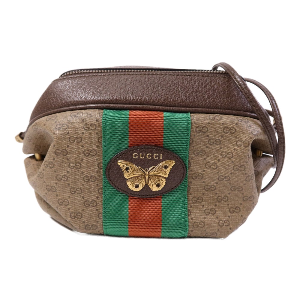 Gucci New Candy Shoulder Bag Brown: Authenticated genuine Gucci New Candy shoulder bag in brown PVC coated canvas with gold-tone hardware. Product no. 0416. Approx. W27 x H13.5 x D14.5 cm with 144 cm strap.