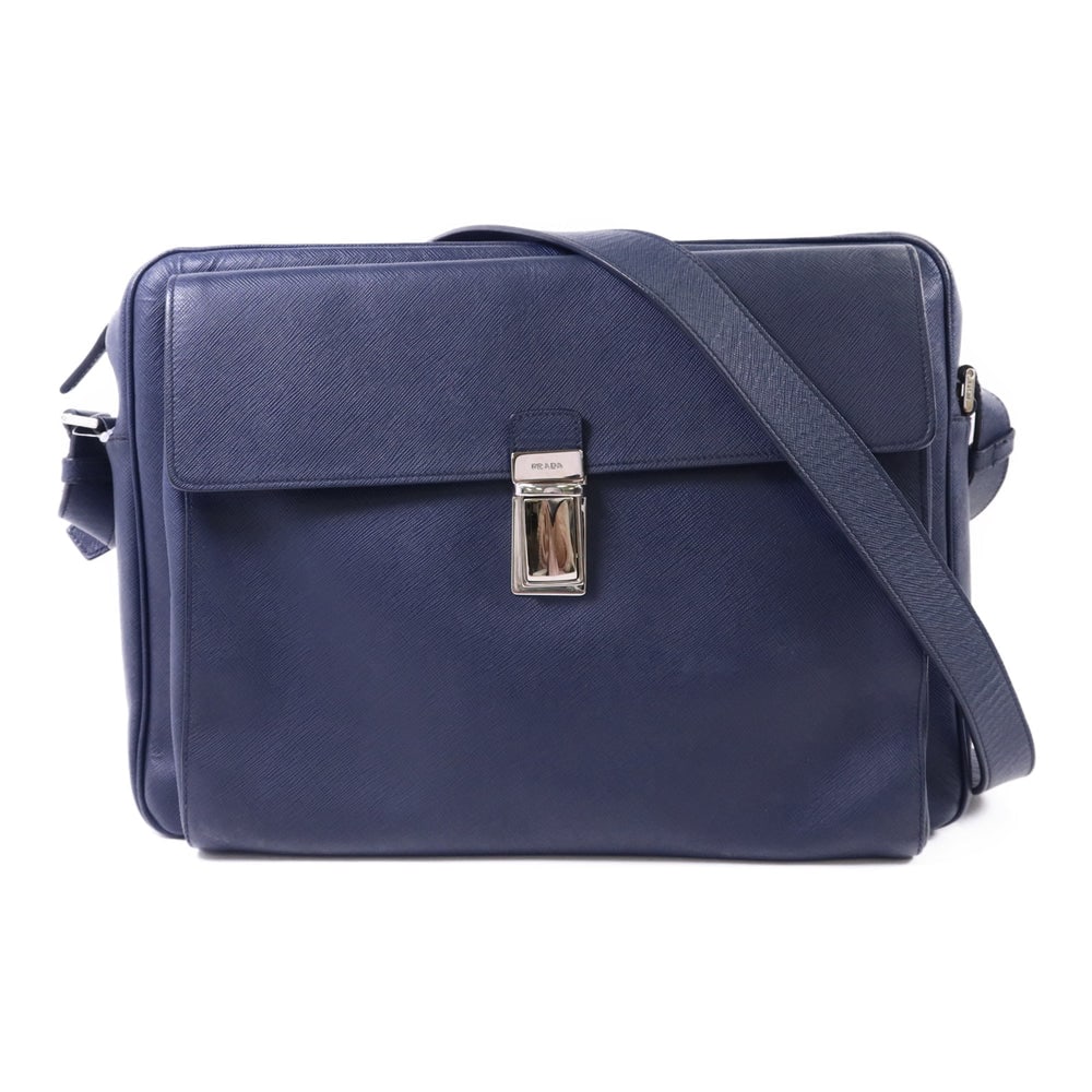 Prada Navy Messenger Bag: Authenticated genuine Prada shoulder messenger bag in navy calfskin leather, model VA1022. Includes storage bags and guarantee. Approx. W37 x H26.5 x D11 cm; shoulder 120-130 cm.