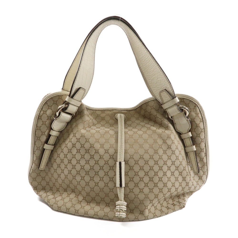Celine Bitter Sweet Beige: Celine Bitter Sweet Handbag. Color: Beige. Material: Calfskin, Canvas. Size: 40 X 30 X 12 Cm. Handle: 43 Cm.