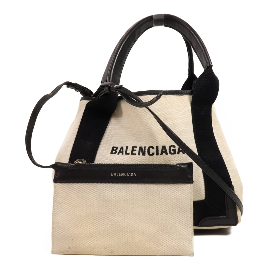 Balenciaga Cabas XS 2 Way White Black: Cabas XS 2 way shoulder handbag 390346 in white and black canvas. Includes pouch. Size 24 x 19 x 7 cm.