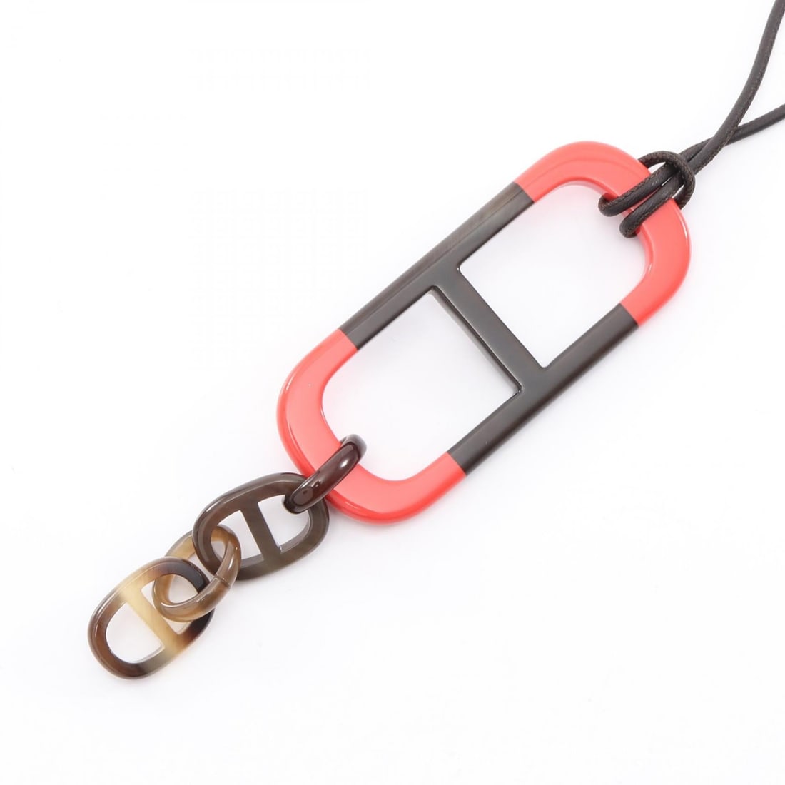 Hermes Amar Necklace Brown: Amar necklace in buffalo horn and leather with pink red and brown tone.