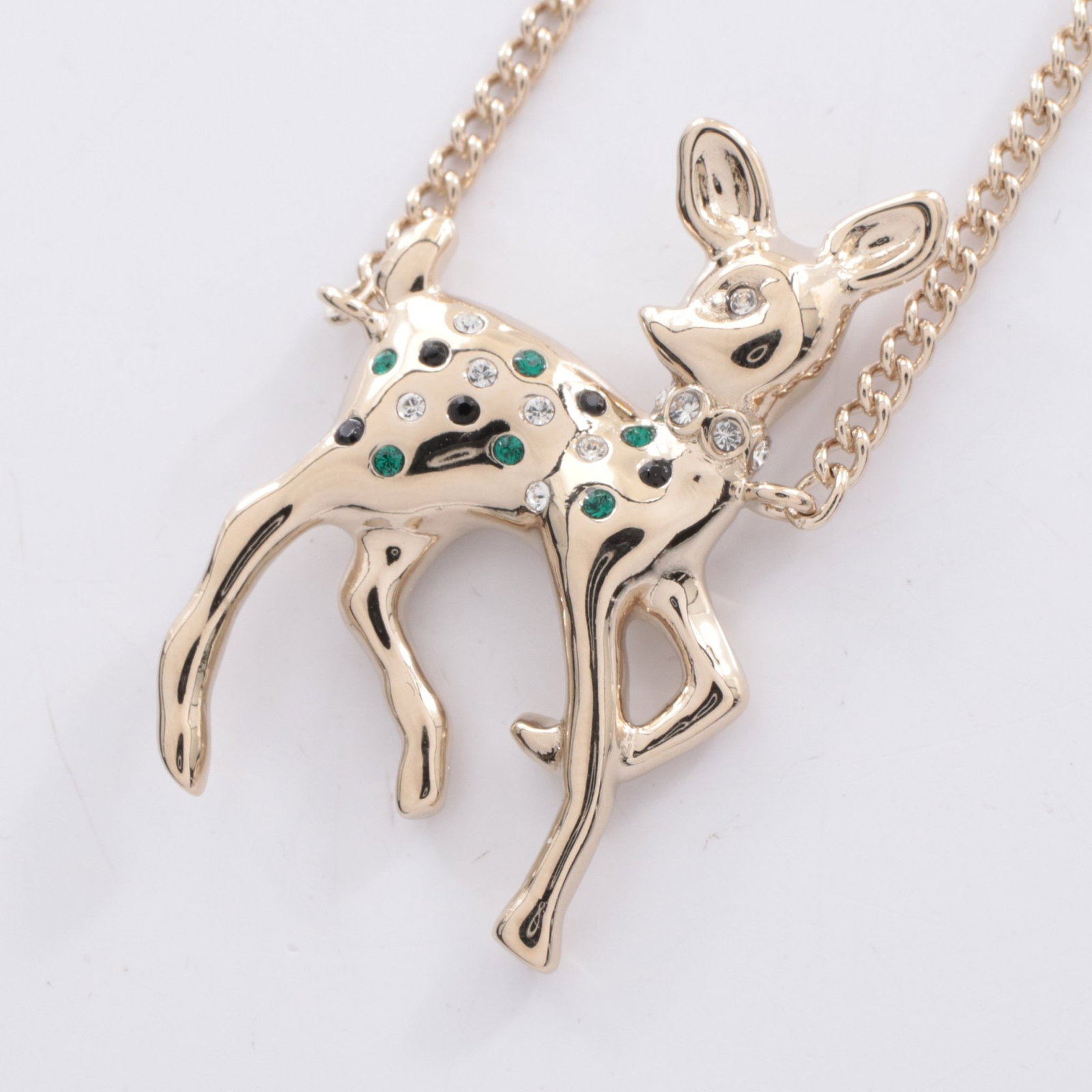 Chanel Deer Motif Coco Necklace: Coco Mark Deer motif necklace in gold tone with fake pearl and rhinestone.