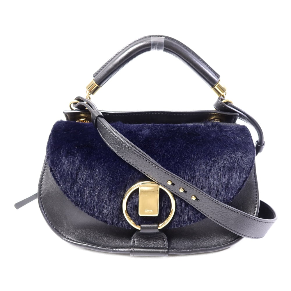 Chloe Goldie 2 Way Shoulder Black Blue: Goldie 2 way shoulder bag in calfskin and shearling with black and blue tones. Size 25 x 17 x 7 cm. Handle 23 cm. Shoulder up to 80 cm.