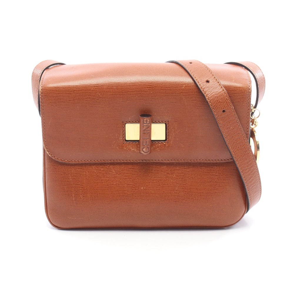 Celine Shoulder Bag Brown: Celine Shoulder Bag. Color: Brown. Material: Leather. Size: 22 X 17 X 1.5/5/1.5 Cm. Strap: 102-116 Cm.