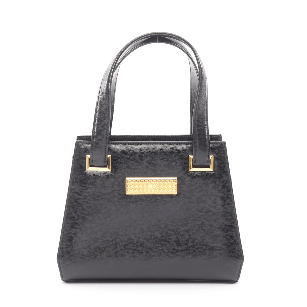 Christian Dior Cd Handbag Black: Christian Dior Cd Logo Handbag. Color: Black. Material: Leather. Size: 17.5/21 X 17 X 9 Cm. Handle: 38 Cm.