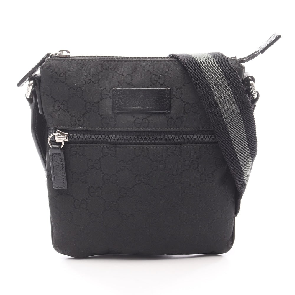 Gucci GG Pattern Shoulder Bag Black: Black nylon and leather shoulder bag. Model 449183. 19 x 21 x 1 cm.