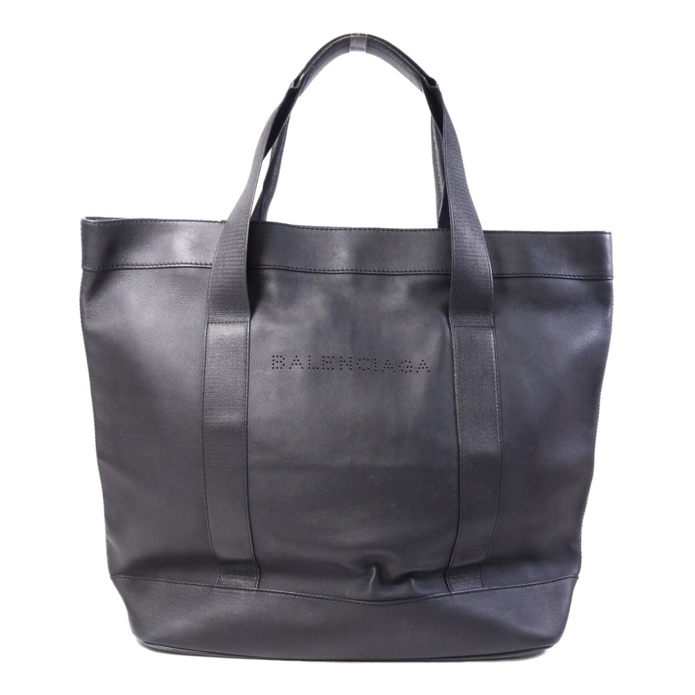 Balenciaga Black Leather Tote Bag: Authentic and authenticated Balenciaga tote bag in black calfskin. Product no. 10000.E.002123. Approx. 37.5W x 39H x 17D cm with 60 cm handle. No accessories listed.