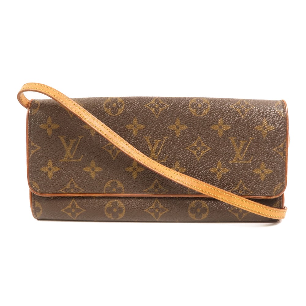 LV Pochette Twin GM Monogram: Authentic and authenticated Louis Vuitton Pochette Twin GM shoulder bag in brown Monogram PVC coated canvas. Product no. FL1000. Approx. 24W x 12H x 2D cm with 106 cm shoulder strap.