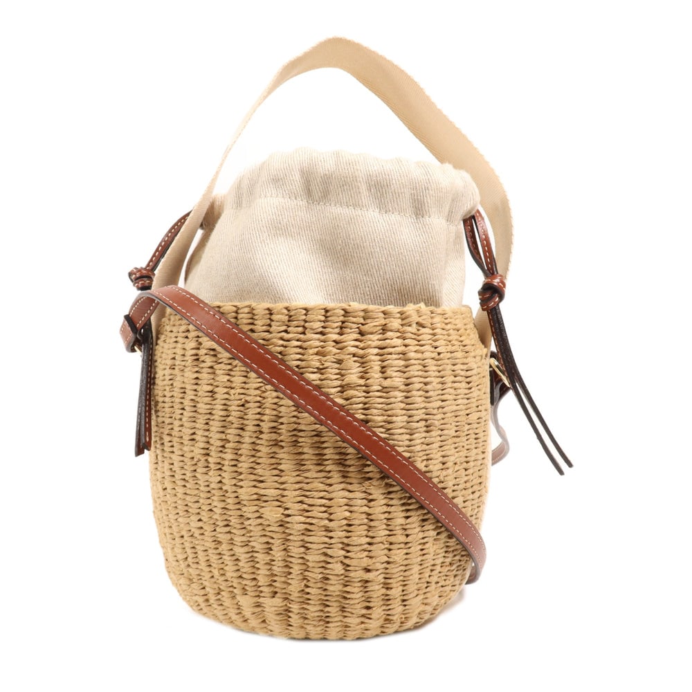 Chloe Woody Basket 2WAY Bag: Authentic and authenticated Chloe Woody Basket Bag 2 way shoulder handbag in brown and beige raffia. Product no. 30-22-68-65. Approx. 14W x 23H x 14D cm with 36 cm handle and 99 cm strap. Includes