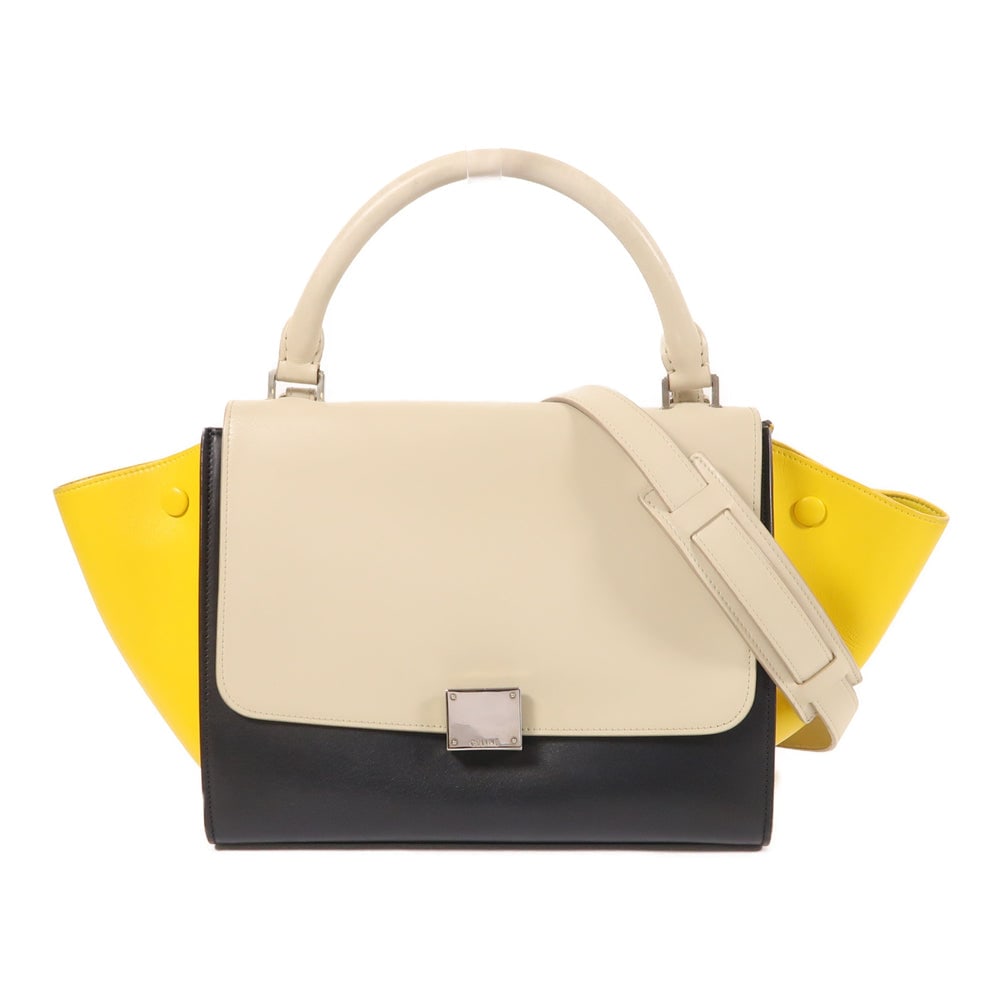 Celine Trapeze 2 Way Grey: Authentic and authenticated Celine Trapeze 2 Way shoulder bag in gray and black calfskin. Product no. V-CU-0195. Approx. 27W x 21H x 15D cm with 31 cm handle and 77.5 cm strap. Includes storage bags