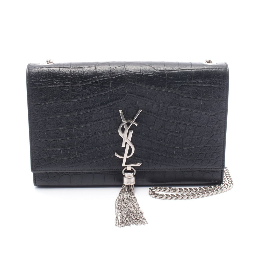 Saint Laurent Kate Tassel Chain: Authentic and authenticated Saint Laurent Paris Kate Tassel Medium chain shoulder bag in black croc embossed leather. Model 354119. Approx. 16 x 24 x 5 cm with 102 cm chain strap.