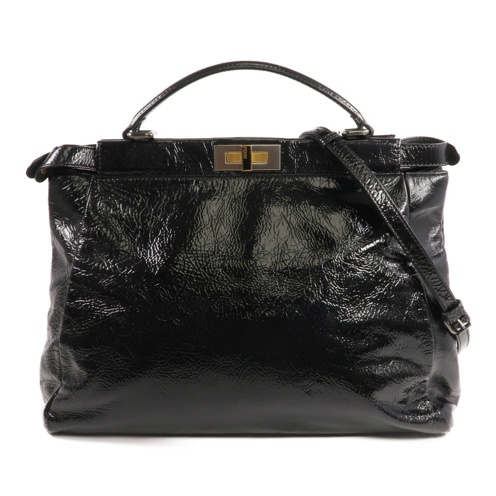 Fendi Peekaboo Satchel 2Way: Authentic and authenticated Fendi Peekaboo Satchel 2WAY shoulder bag in black patent leather. Approx. 38 x 31 x 15 cm with 33 cm handle and adjustable 103-136 cm shoulder strap.