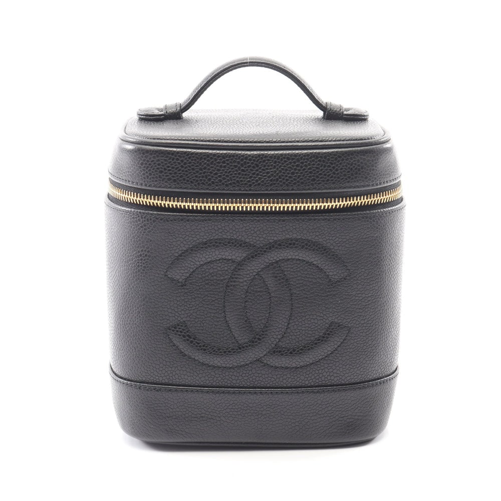 Chanel Coco Mark Vanity Black: Authentic and authenticated Chanel Coco Mark vanity handbag in black caviar skin with gold hardware. Model A01998. Includes guarantee card and serial seal. Approx. 17 x 15 x 12 cm.