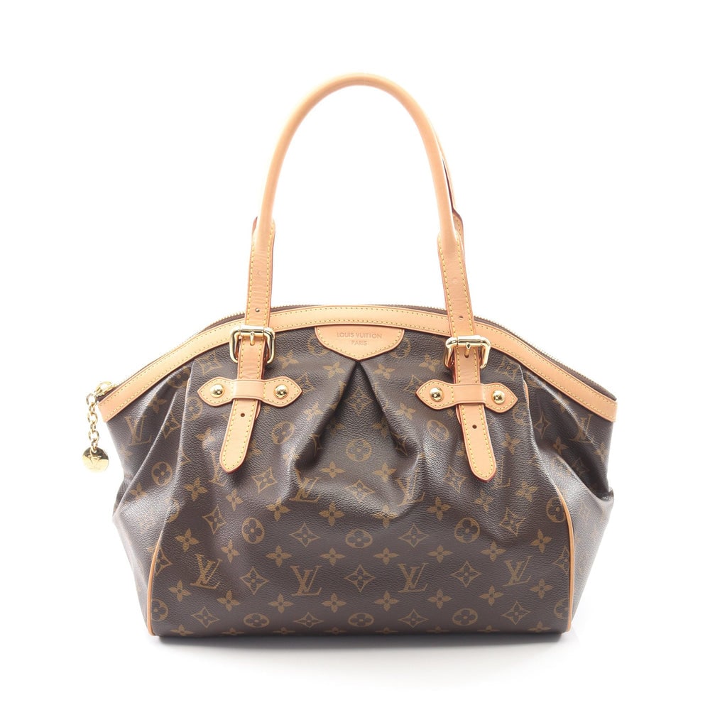 LV Tivoli GM Monogram Brown: Brown Monogram PVC leather Tivoli GM handbag. Approx. 43 x 27 x 19 cm; handles 43-67 cm. Model M40144, product no. MB1104. Authentic and authenticated.