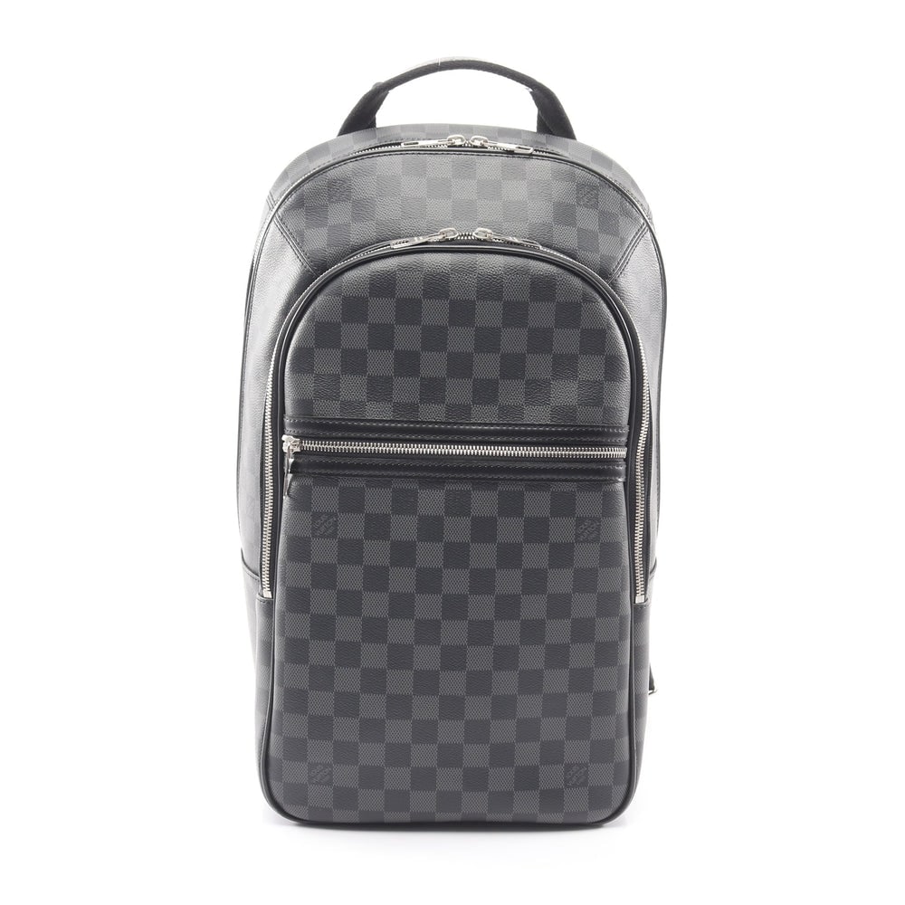 LV Michael Damier Graphite Backpack: Black PVC leather Michael Damier Graphite backpack. Approx. 28 x 45 x 5.5/12 cm; straps 73-86 cm; handle 24 cm. Model N58024, product no. BA1165. Authentic and authenticated.