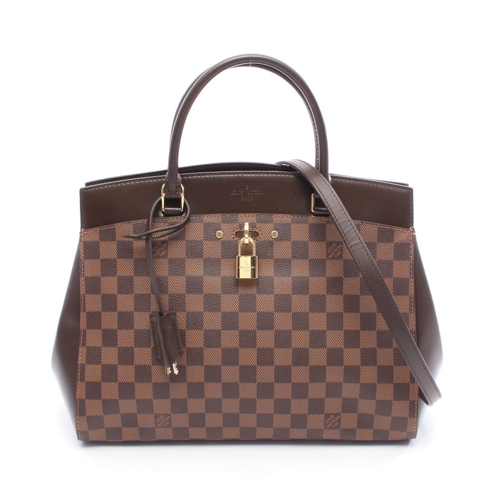 LV Rivoli MM Damier Brown: Brown Damier Ebene PVC leather Rivoli MM handbag with shoulder strap, padlock, 2 keys, and crochet. Approx. 39 x 27 x 3 cm; handle 42 cm; strap 122 cm. Model N41150. Authentic and authenticated.