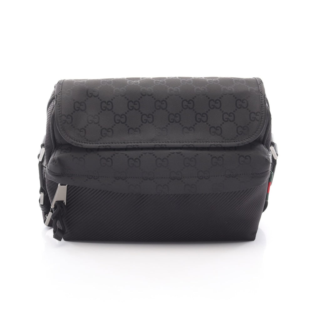 Gucci GG Nylon Crossbody Black: Black nylon Gucci GG nylon medium crossbody shoulder bag with storage bags. Approx. 27 x 22 x 4/8 cm; strap 85-185 cm. Model 816820FAD731047. Authentic and authenticated.