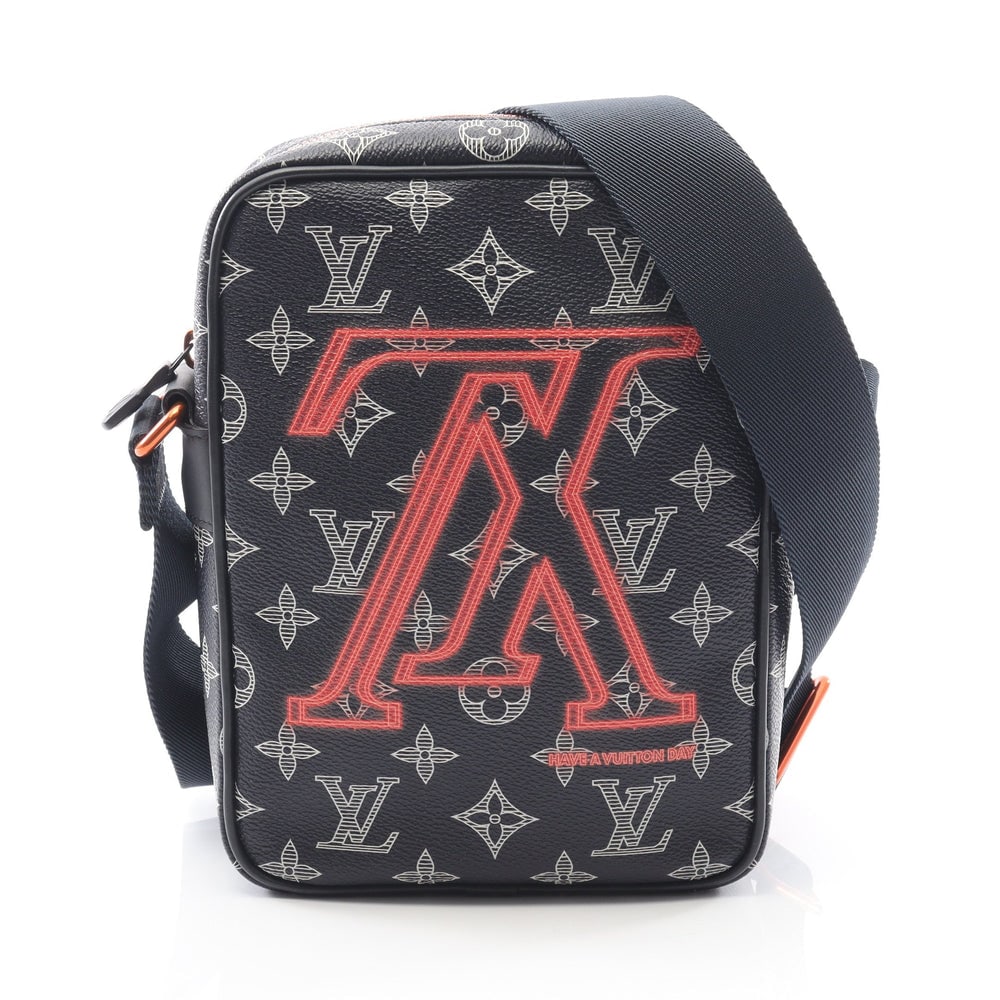 LV Danube PM Navy Red White: Navy, red, and white Monogram Ink Upside Down PVC leather Danube PM shoulder bag. Approx. 16 x 21.5 x 6.5 cm; strap 83-152 cm. Model M43678. Authentic and authenticated.