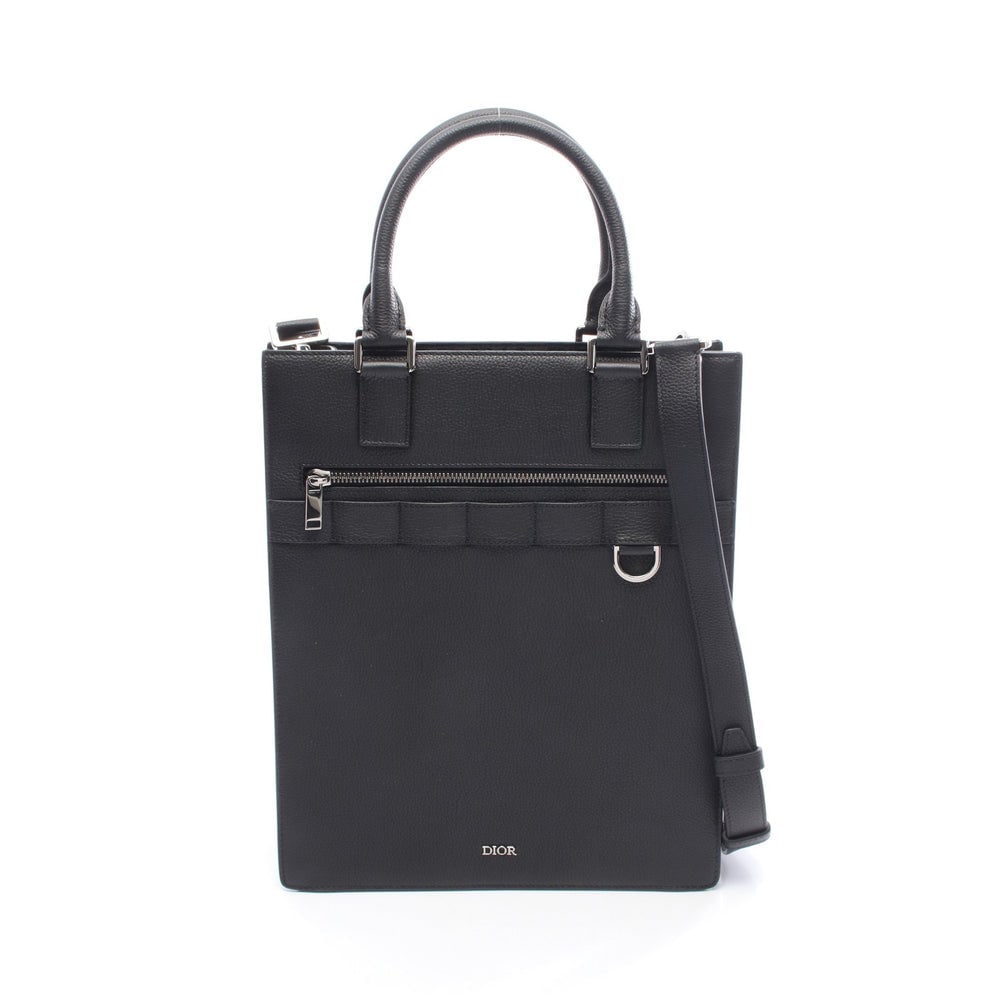 Dior Safari North South Black: Black leather Dior Safari North South 2-way tote with shoulder strap. Approx. 28 x 33.5 x 8.5 cm; handle 37 cm; strap 110-126 cm. Model 1ESSH187UMJ. Authentic and authenticated.