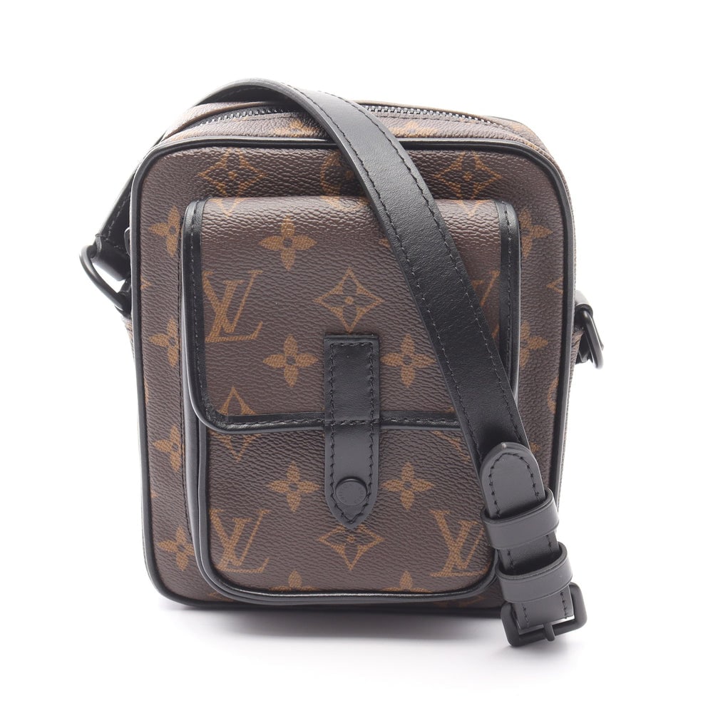 LV Christopher Wallet Brown Black: Brown and black Monogram Macassar PVC leather Christopher Wearable Wallet shoulder bag. Approx. 14 x 18 x 4.5 cm; strap 114-124 cm. Model M69404, RFID noted. Authentic and authenticated.