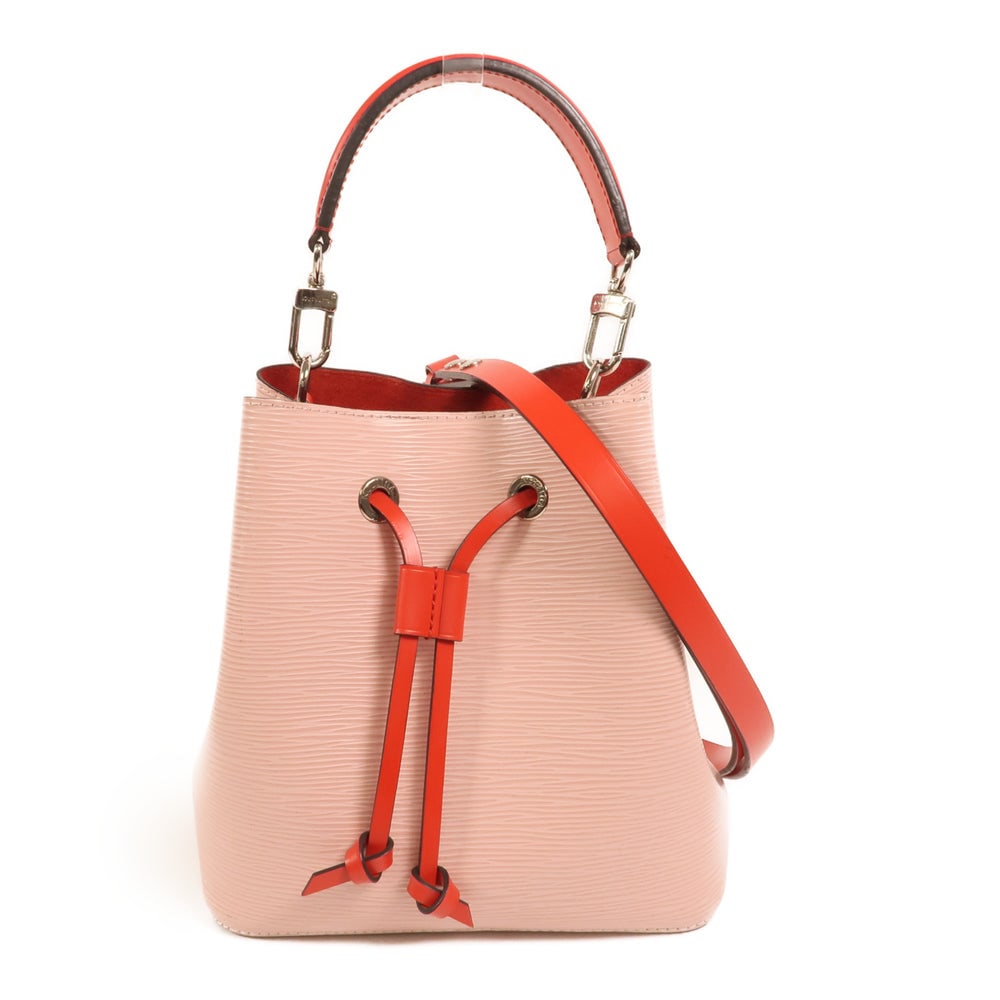 LV Neo Noe BB Epi Pink: Pink Epi calfskin Neo Noe BB 2-way shoulder bag. Approx. 20 x 20 x 13 cm; handle 31 cm; strap 69-116 cm. Product no. SR2119. Authentic and authenticated.