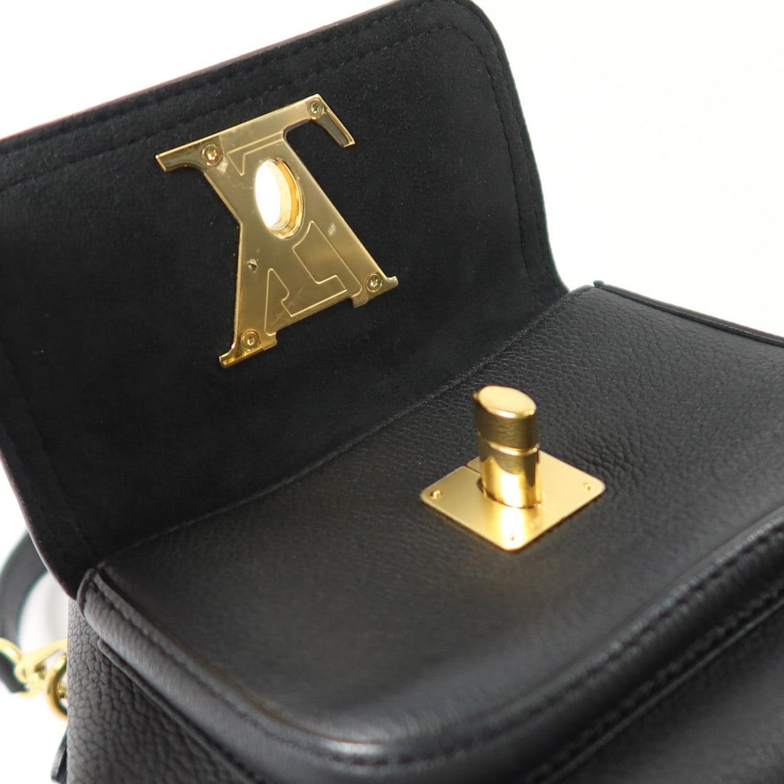 Louis Vuitton Lockme Bucket: Black calfskin bucket handbag.