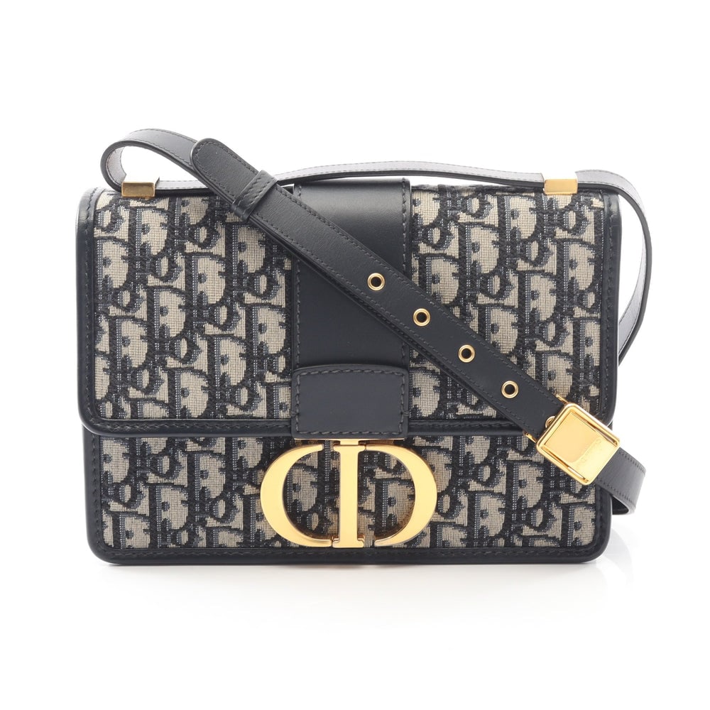 Dior 30 Montaigne Chain Bag: Beige and navy Oblique jacquard canvas and leather chain shoulder bag; H17 x W24 x D6 cm; strap 58-68 or 106-116 cm. Authentic and authenticated.