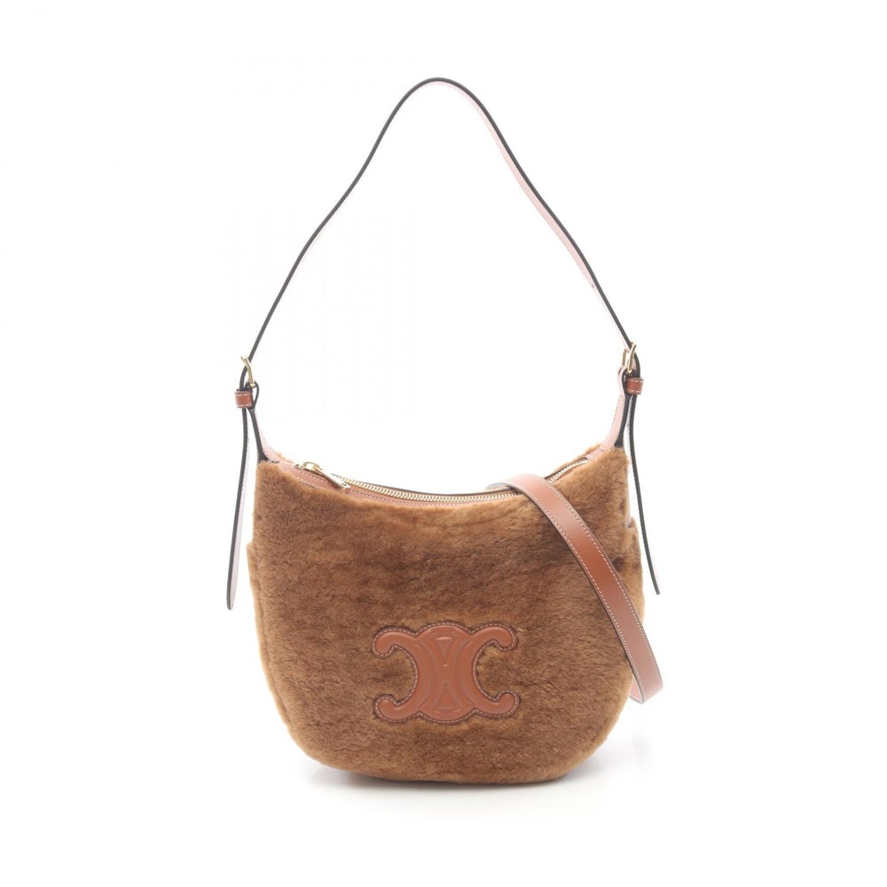 Celine Heloise Small Brown: Brown leather and fur shoulder bag. Includes storage bag and shoulder strap. 21 x 20 x 7 cm.