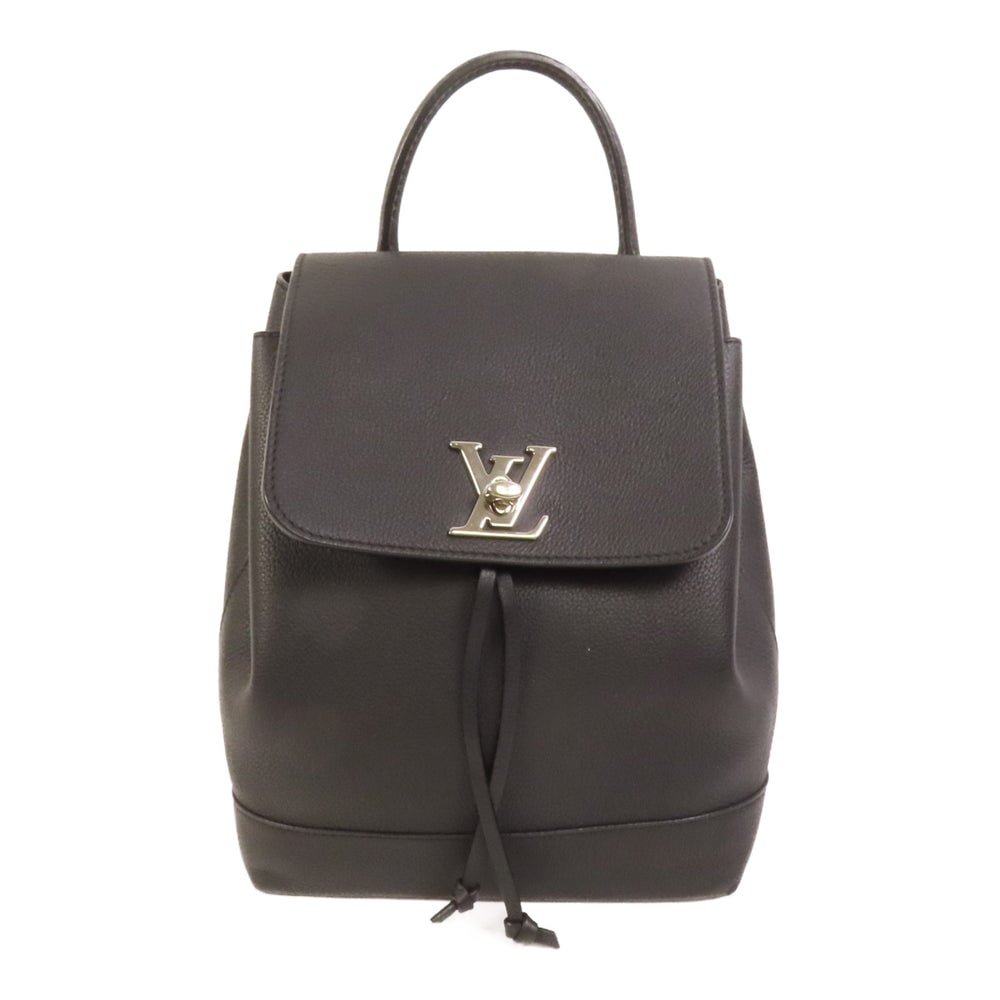 LV Lock Me Backpack Black: Black calfskin backpack with SHW; W21 x H27 x D12 cm; handle 25 cm; strap 68-78 cm. Authentic and authenticated.