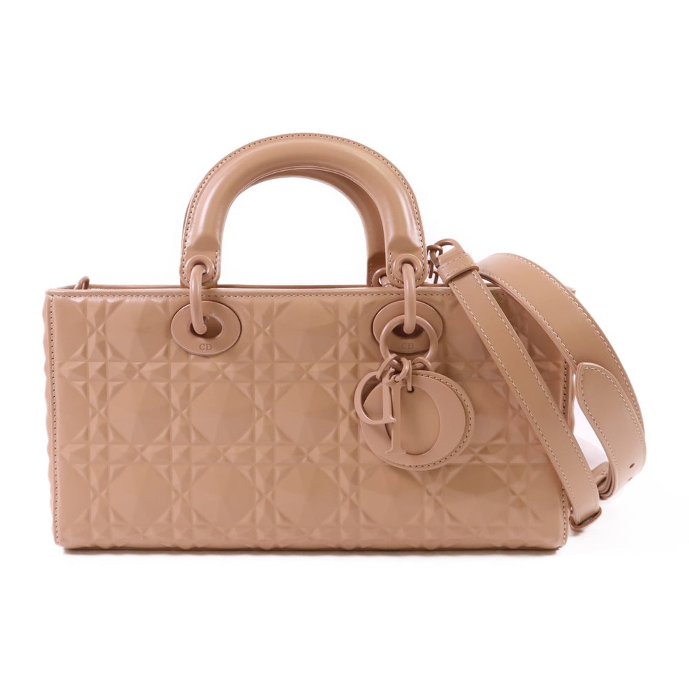 Dior Lady D-Joy Beige: Beige calfskin 2Way shoulder bag. Includes box and shoulder strap. 26 x 13 x 5.5 cm.