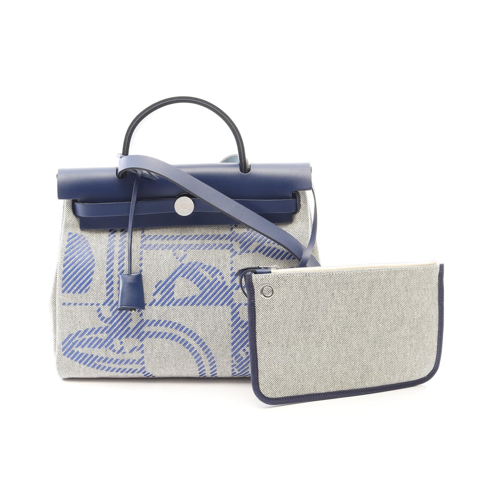 Hermes Herbag Zip PM Ecru Blue Saphir: Toile H canvas and Vache Hunter 2-way handbag with strap and pouch.
