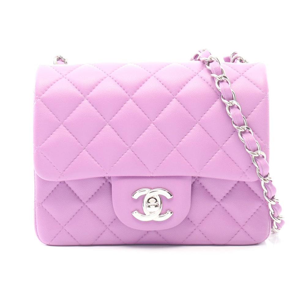Chanel Mini Matelasse Purple: Purple lambskin mini matelasse chain shoulder bag with silver-tone hardware.
