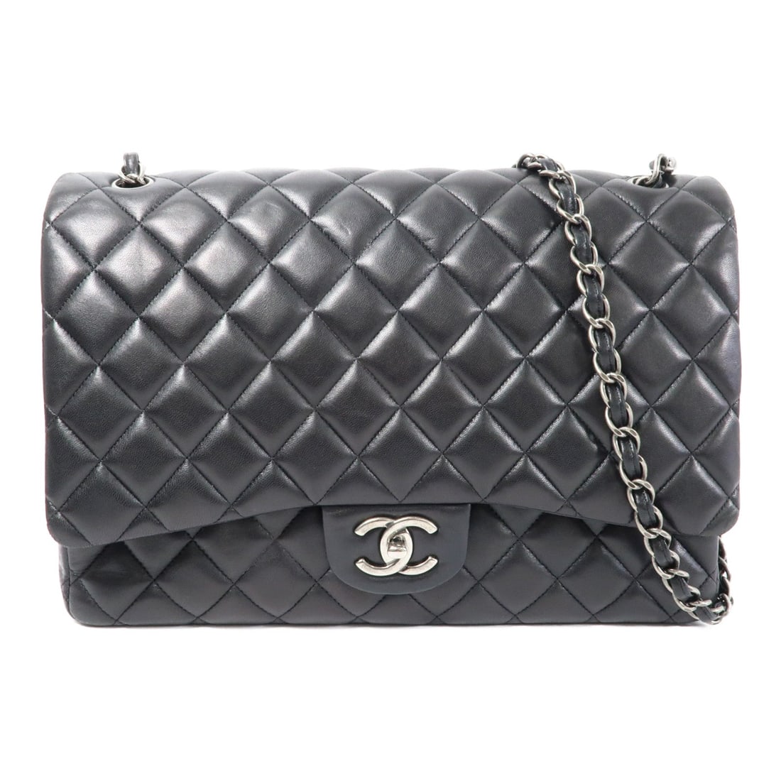 Chanel Maxi Classic Black: Black lambskin maxi classic chain shoulder bag.