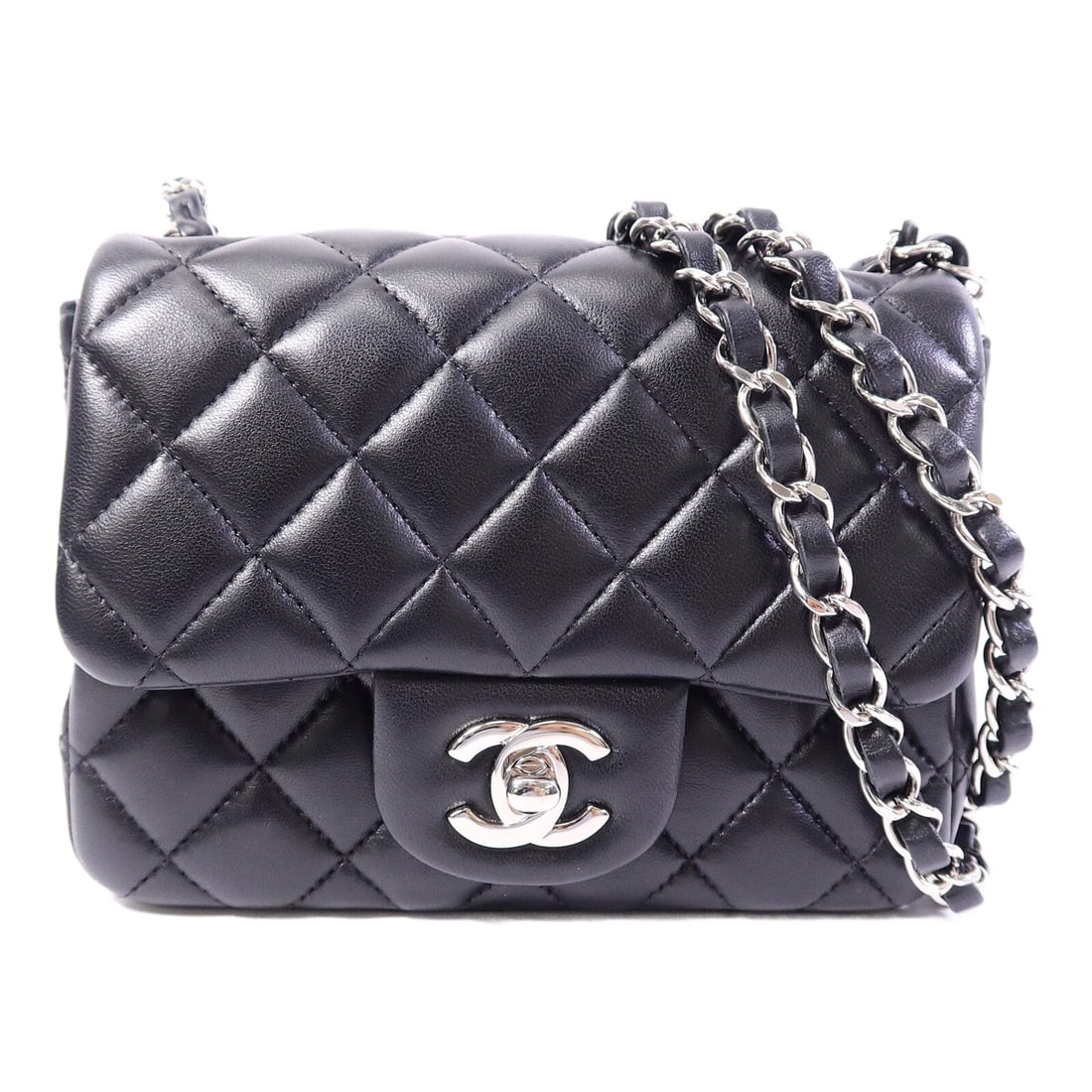 Chanel Mini Classic 17 Black: Black lambskin mini classic chain shoulder bag with silver-tone hardware.