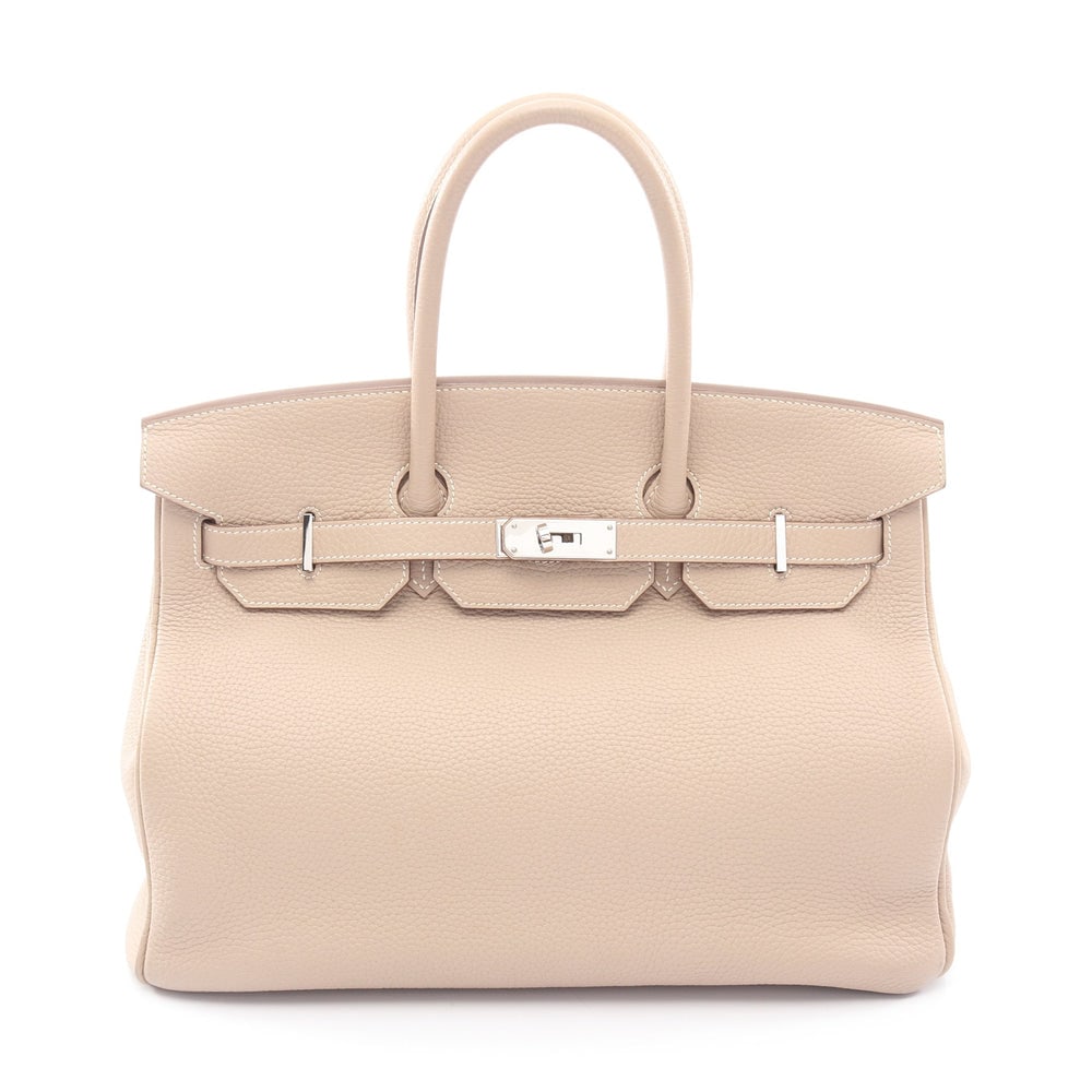Hermes Birkin 35 Argil: Light beige togo handbag with silver hardware. Includes padlock keys and crochet. 35 x 28 x 18 cm.