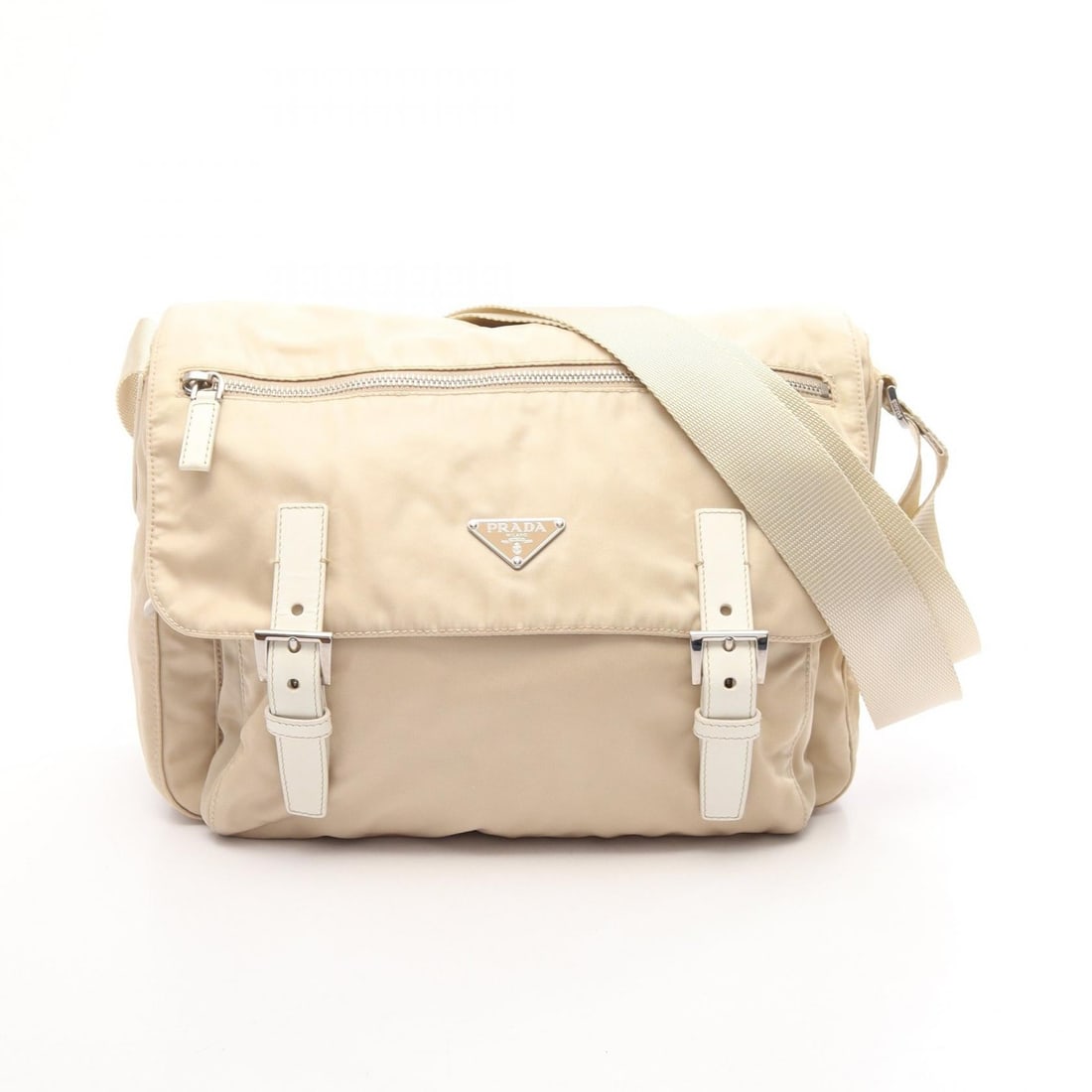 Prada Nylon Leather Shoulder Bag Beige: Authentic and authenticated Prada logo plate shoulder bag in beige/ivory nylon and leather. Approx. 25H x 30/29W x 12D cm with 81-136 cm strap. No accessories listed.