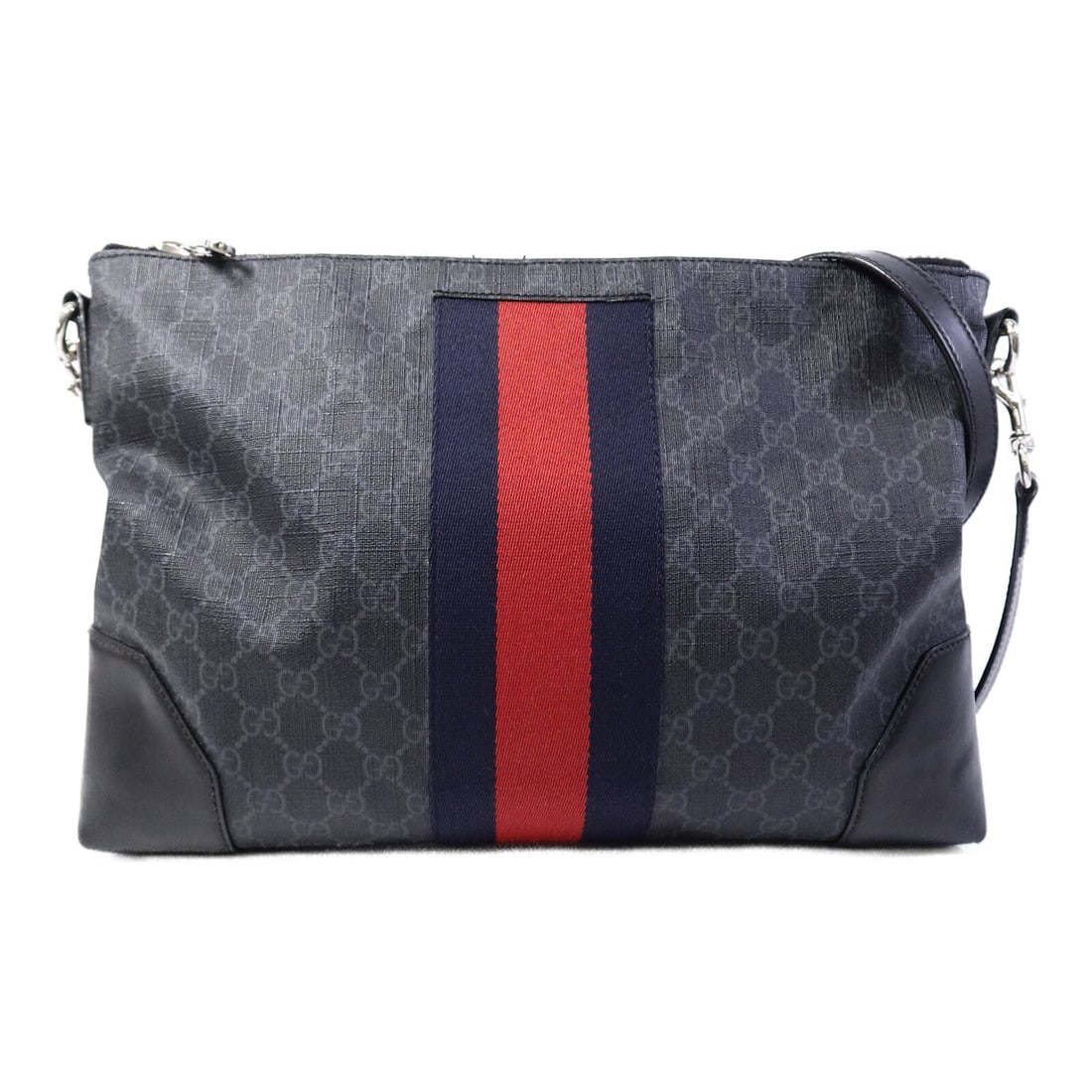 Gucci Coated Canvas Shoulder Bag: Authentic and authenticated Gucci GG shoulder bag in black/gray PVC coated canvas. Product no. 213317. Approx. 34.5W x 25H x 4.5D cm with 109-119 cm strap. Includes storage bags and shoulder strap.