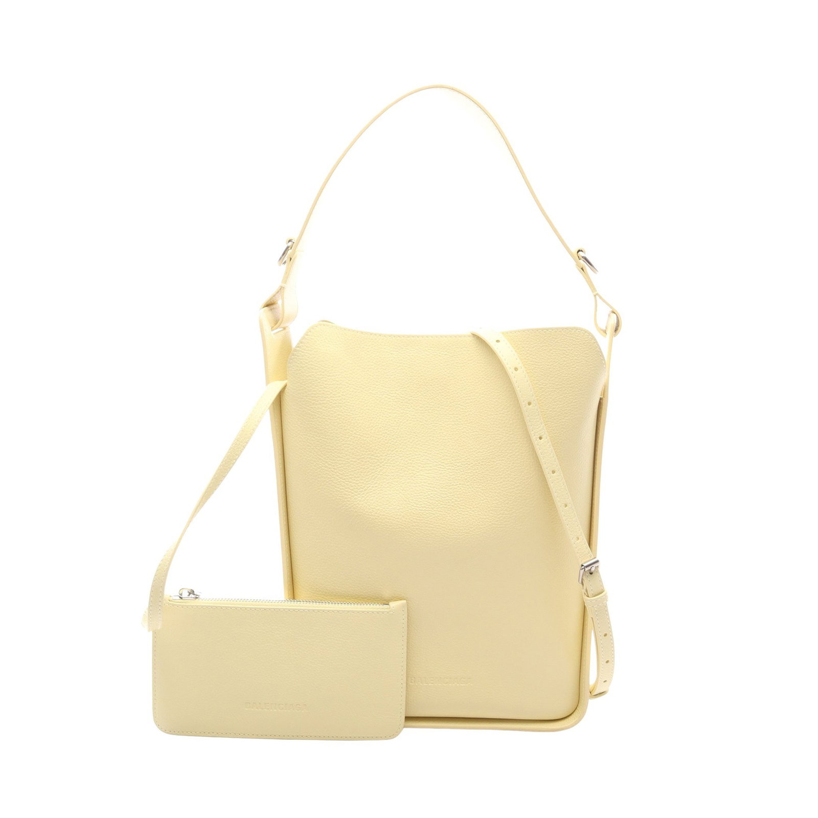 Balenciaga North South 2WAY Yellow: Authentic and authenticated Balenciaga North South 2WAY one shoulder bag in light yellow leather. Model 659920. Approx. 30H x 27/21W x 11D cm with 46 cm handle and 30-107 cm strap. Includes strap and
