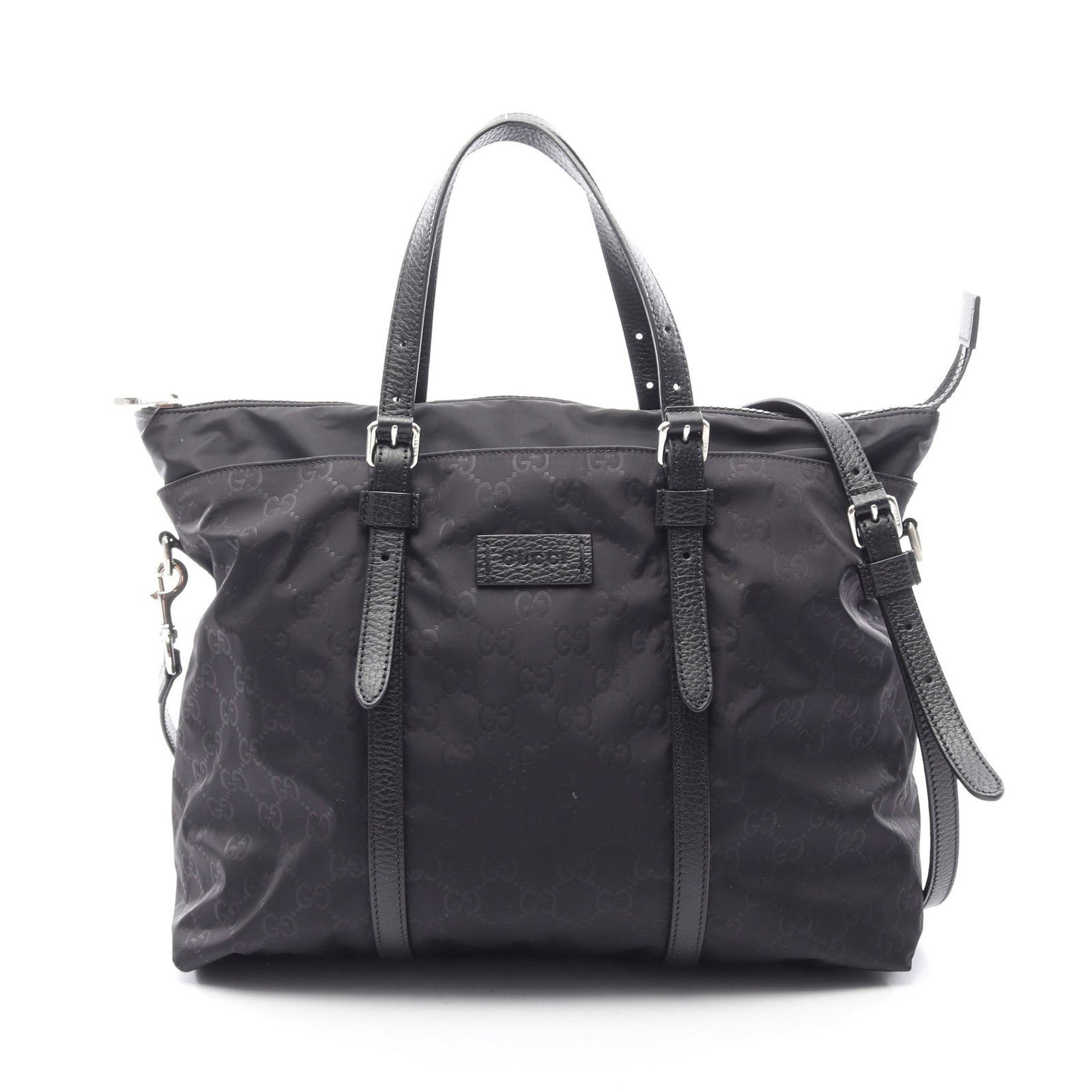 Gucci Nylon 2WAY Tote Bag Black: Authentic and authenticated Gucci GG pattern 2WAY tote handbag in black nylon and leather. Model 510332. Approx. 27H x 38/35W x 15D cm with 29-49 cm handle and 113.5-123.5 cm strap. Includes shoulder 