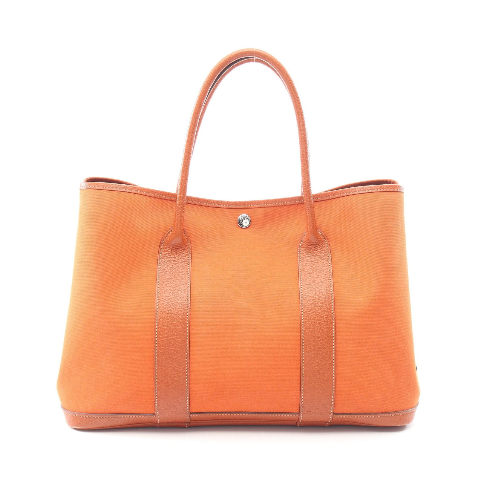 Hermes Garden Party PM Potiron: Authentic and authenticated Hermes Garden Party PM Potiron tote handbag in orange brown Toile Officier Buffalo with silver hardware. Approx. 25H x 36W x 17D cm with 44 cm handle. ?I stamp.