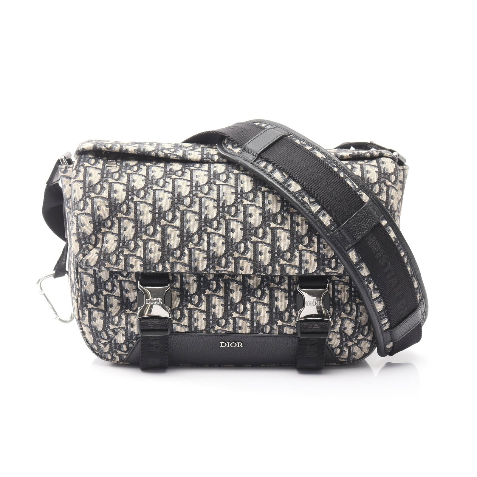 Dior Explorer Oblique Messenger: Authentic and authenticated Dior Explorer Messenger Oblique shoulder bag in light beige, navy, and black canvas leather. Model 1ESME061YKY_H27E. Approx. 22H x 31/27.5W x 8D cm with max 118 cm strap.