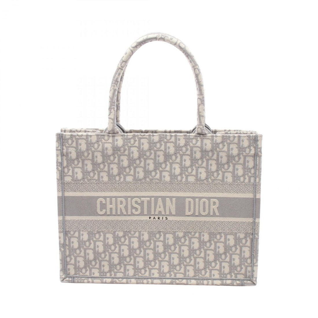 Dior Book Tote Medium Oblique Gray: Authentic and authenticated Christian Dior Book Tote Medium Oblique handbag tote in gray canvas. Model M1296ZRIW_M20I. Approx. 27H x 36W x 14D cm with 42 cm handles.