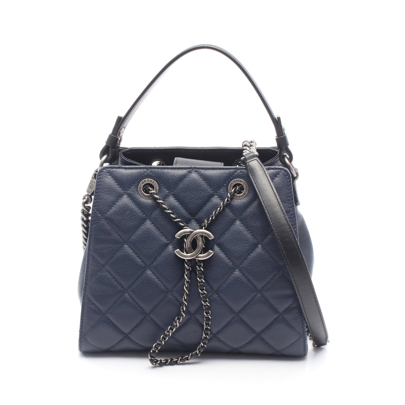Chanel CC Bucket Matelasse 2WAY: Authentic and authenticated Chanel CC Bucket Matelasse 2WAY handbag in navy and black caviar skin leather with silver hardware. Model A93354. Approx. 19H x 17/22W x 11D cm. Includes chain strap,