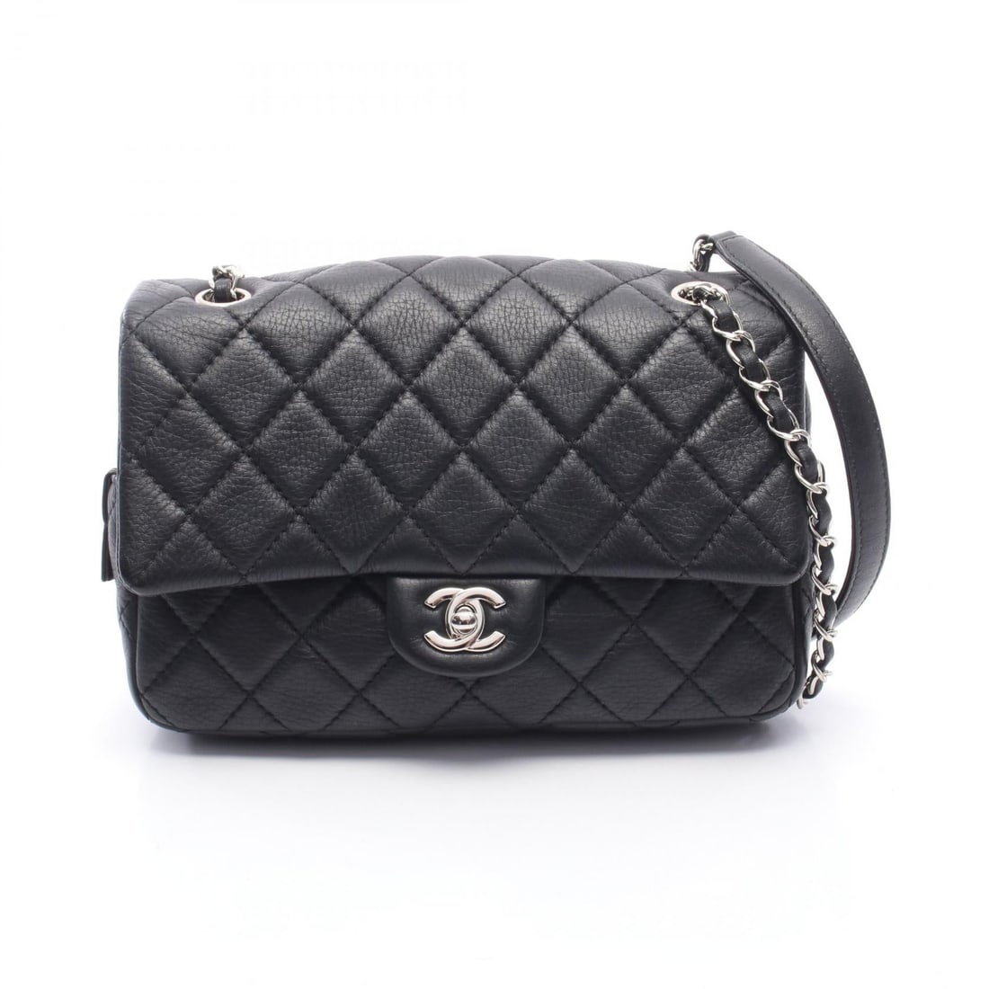 Chanel Chain Shoulder Bag Black: Authentic and authenticated Chanel Matelasse chain shoulder bag in black leather with silver hardware. Approx. 17H x 24W x 6D cm with double or single chain wear. Includes guarantee card and serial