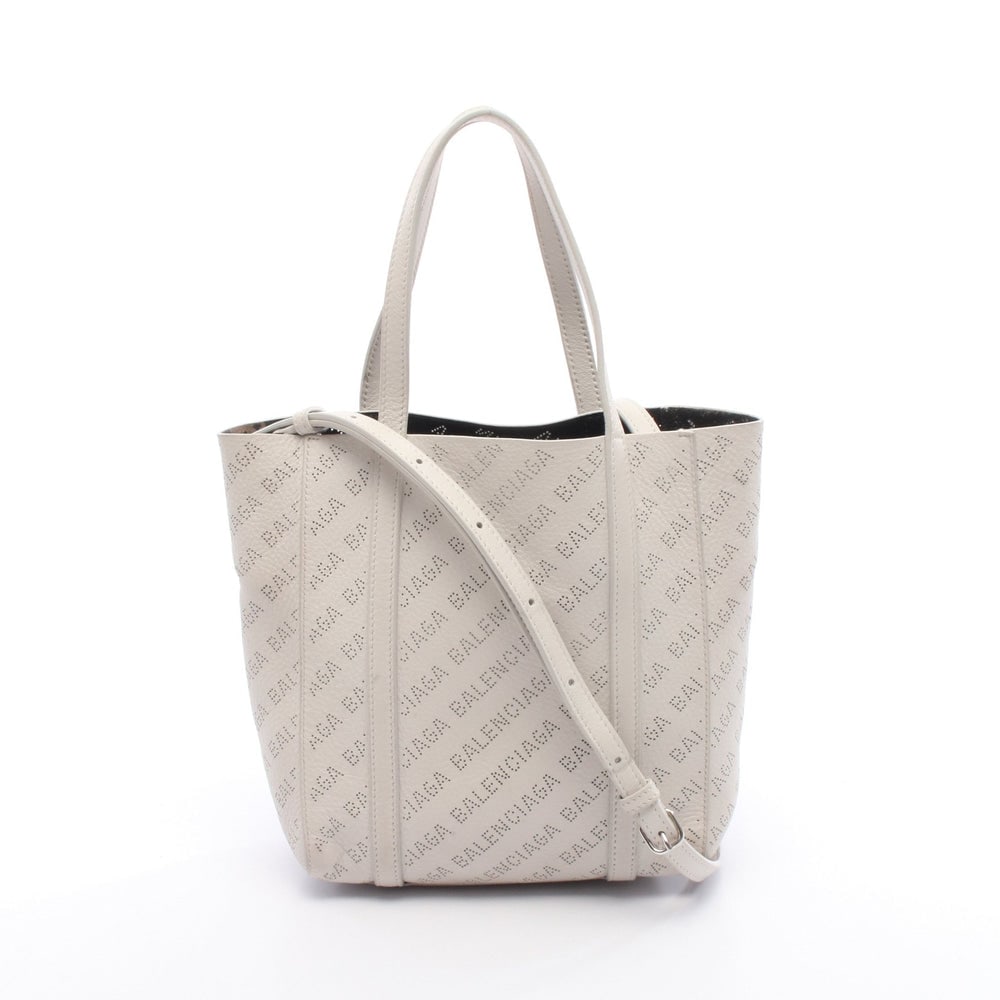 Balenciaga Everyday XXS 2WAY Tote: Authentic and authenticated Balenciaga Everyday XXS 2WAY tote handbag in off white leather. Model 551815. Approx. 22H x 19W x 9D cm with 32 cm handle and 110-134 cm strap.