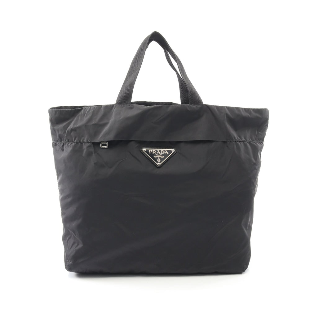 Prada Nylon Tote Handbag Black: Authentic and authenticated Prada tote handbag in black nylon with Prada logo plate. Approx. 33H x 45/33.5W x 9D cm with 30 cm handle. Includes storage bag.